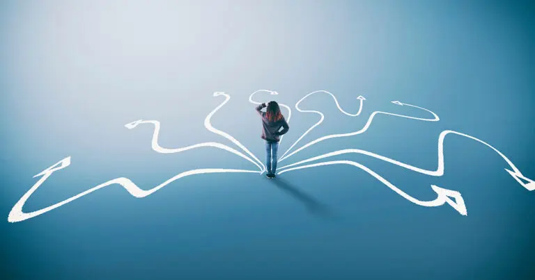 Image of a person standing at the center of multiple paths drawn with arrows on the ground, symbolizing decision-making and navigating choices. The background is a gradient of light blue, emphasizing a sense of uncertainty and possibilities.