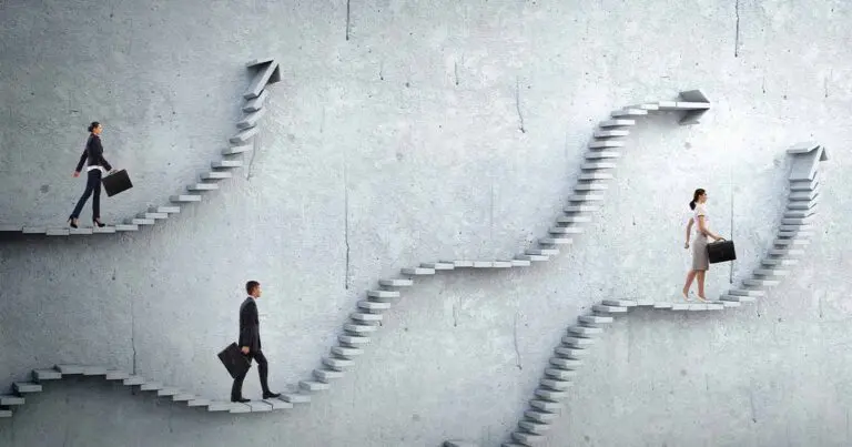 Employees navigating winding staircases shaped like arrows, representing diverse career paths and upward mobility—illustrating how to promote career building in your company through non-linear growth opportunities.