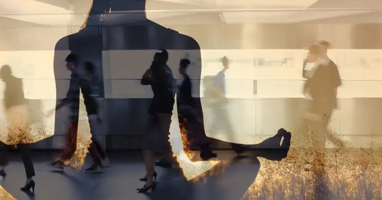 A translucent silhouette of a person meditating in a seated pose is layered over a blurred scene of people walking through a modern hallway, blending calm stillness with the motion of daily life. Warm light and soft earth tones create a peaceful contrast between mindfulness and busyness.