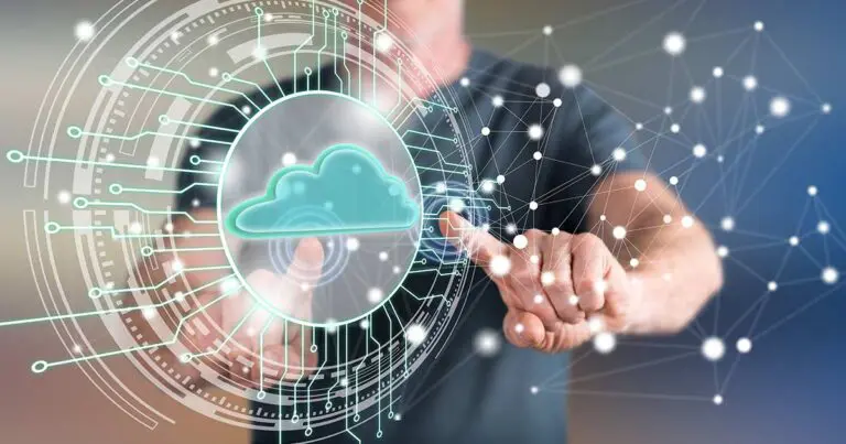 A person reaches forward to interact with a glowing digital cloud icon surrounded by circular circuitry graphics and a web of connected nodes, suggesting cloud computing and data networking.