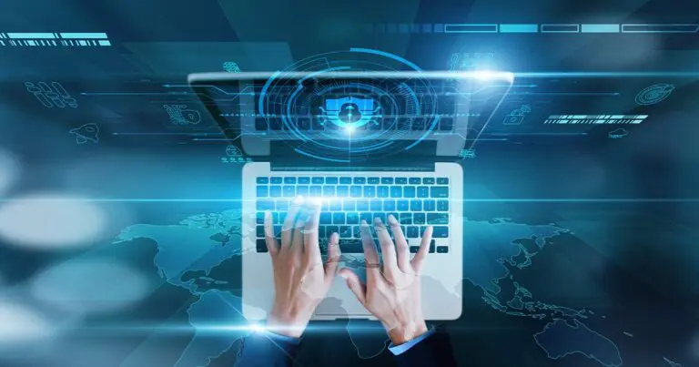 Hands type on a laptop keyboard as translucent digital graphics overlay the screen, including a central padlock icon, data streams, and interface symbols. A faint world map beneath the laptop and glowing blue tones convey themes of cybersecurity, data protection, and global digital networks.