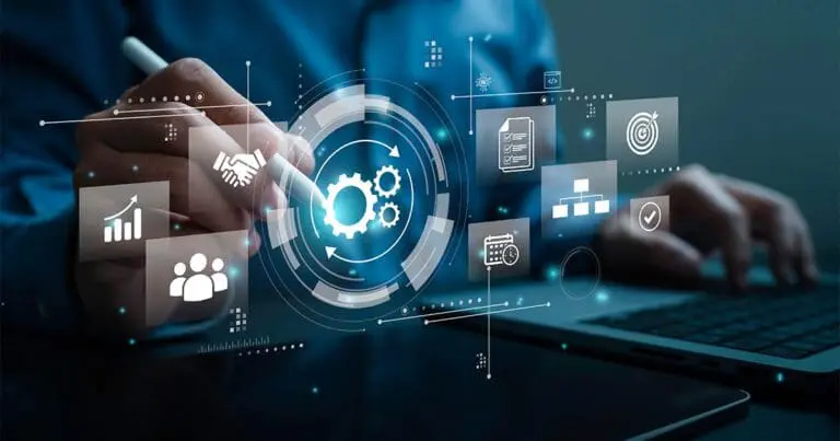 Person using a stylus and laptop interacts with a digital interface displaying floating icons for automation, workflow management, analytics, team collaboration, scheduling, and performance targets. Blue-toned graphics with gears and connected symbols create a futuristic visual representing workplace automation and operational efficiency.