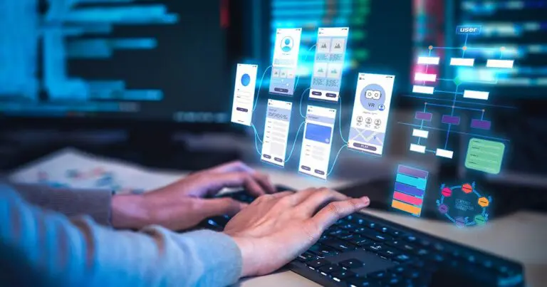 A person types on a keyboard while floating mobile app screens, workflow diagrams, and interface design elements appear above the workstation. The digital overlays, including a VR application mockup and development flowcharts, illustrate AI-assisted software development, application design, and the growing role of experienced engineers in guiding complex projects.