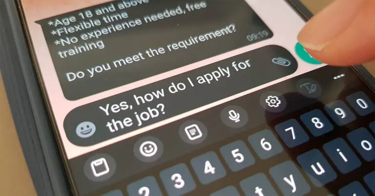 A close-up of a smartphone shows a text message advertising a job for people age 18 and older with flexible hours and no experience required, while a reply asks, “Yes, how do I apply for the job?”