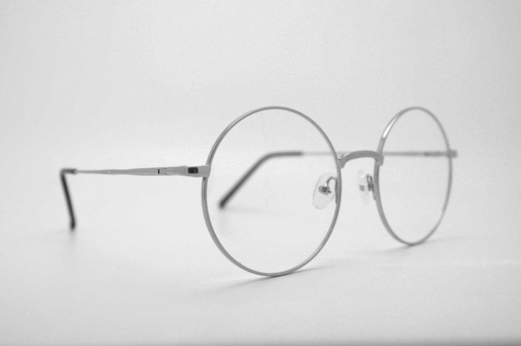 closeup of prescription glasses with round frames