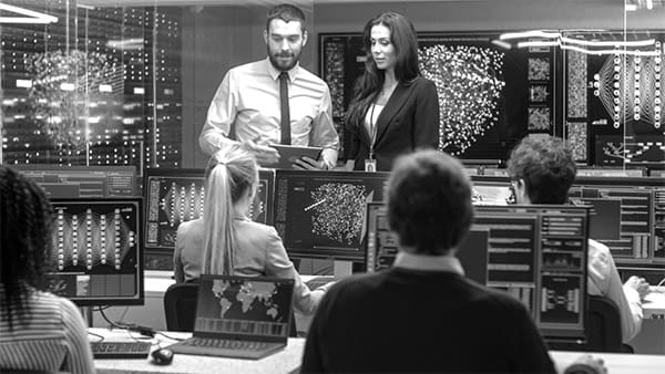 impromptu business meeting in an open office setting
