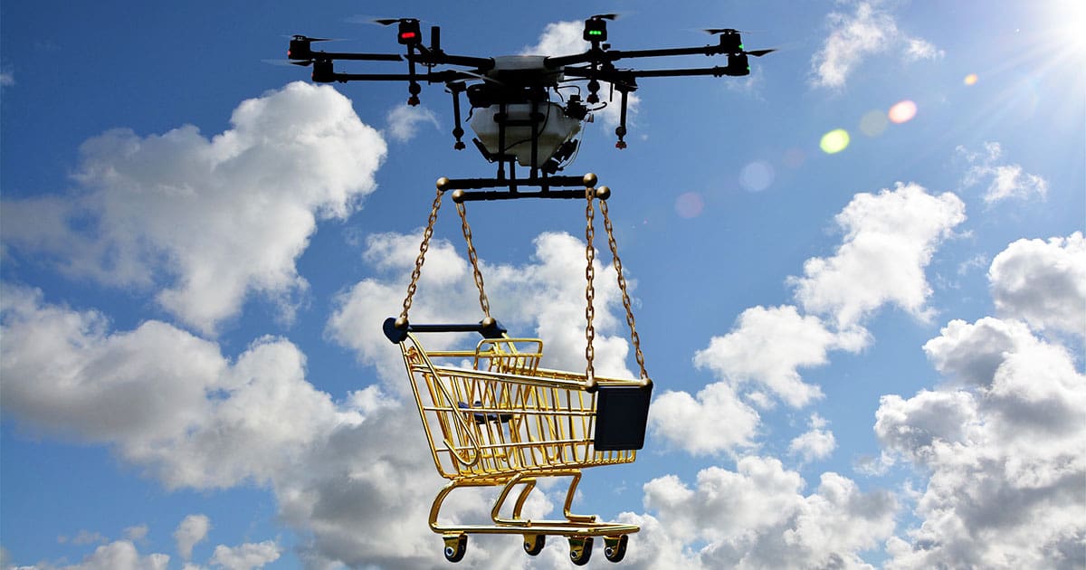 drone carrying a shopping cart